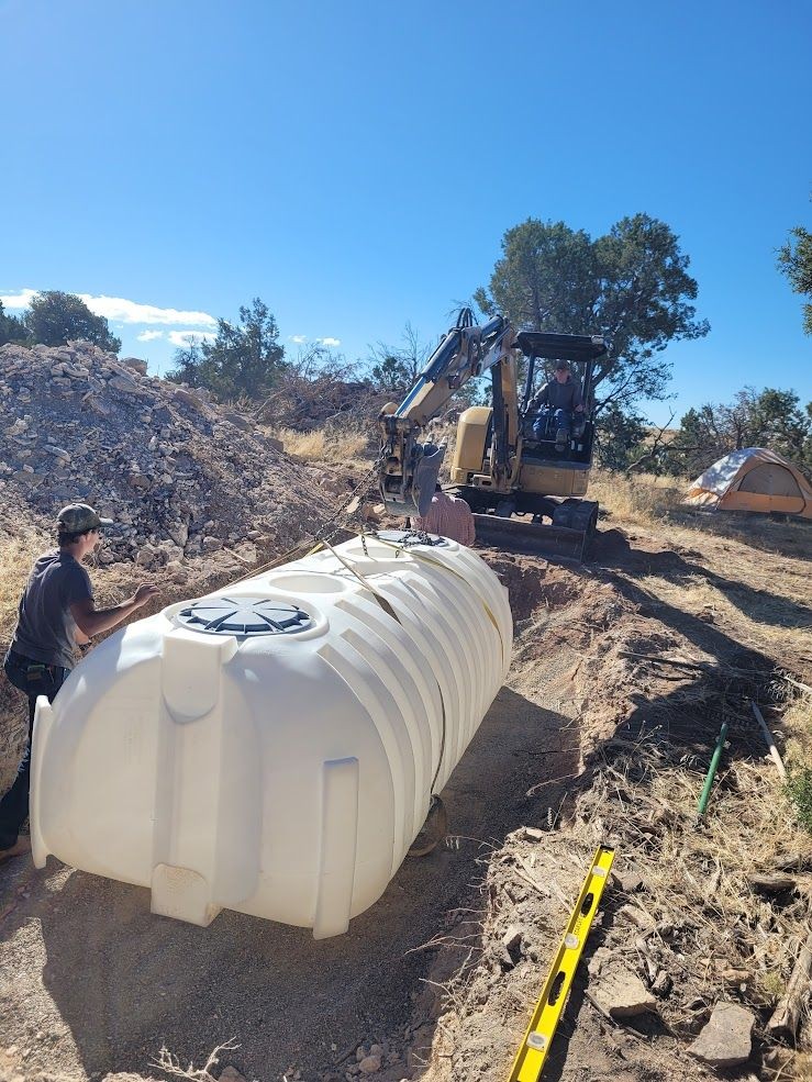 A cistern being installed in the gound colorado